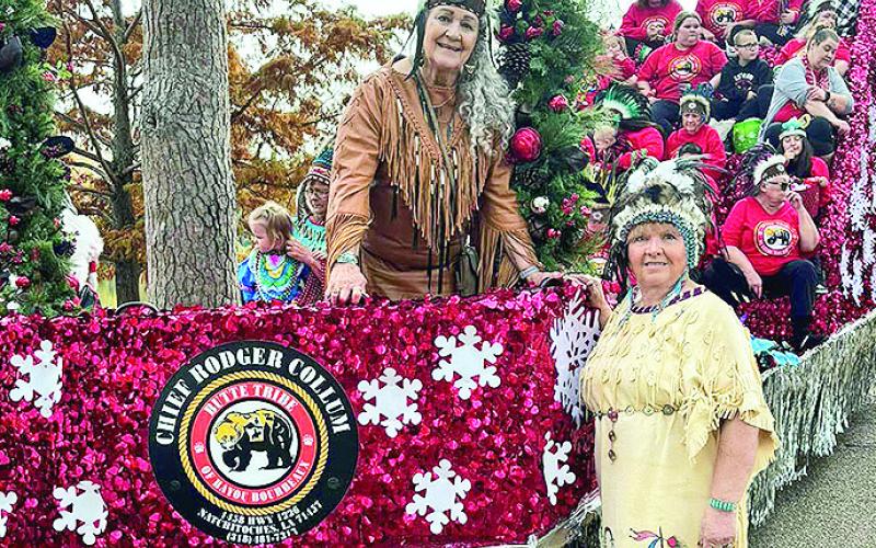 Chief Rodger Collum built the Butte Tribe’s float for the Christmas Festival parade. Council Chief Estella Almond claimed her station on the float and Vice Chief Belinda Brooks wished them well as she prepares to walk the parade route.