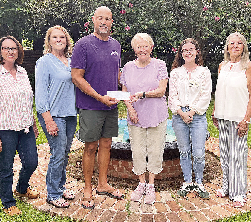 The Krewe of Dionysos has selected the Association for the Preservation of Historic Natchitoches (APHN) as the recipient of one of its annual charitable donations. From left are Carolyn Benefield, Krewe of Dionysos Treasurer; Jodi Shirley, Queen Dionysos XXVIII; Leonard Sarpy, Captain Dionysos XXIX; Chris Evans, chair of the Third Grade Children’s Tour; Abigail Boykin, executive director; and Arleen Mayeux, APHN president.
