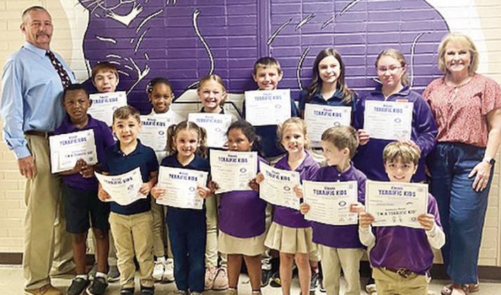 Natchitoches Kiwanis club presented awards to Provencal Elementary/ Jr. High’s Terrific Kids. Pictured in the front row are Adrian Key, Bishop Callahan, Nevaeh Ellerbe, Raleigh Conday, Navayah Cole, Jaxon Reese and Graisyn Niette. In the back row are Coordinator Dwayne Poe, Waylen Rachal, Serenity Brooks, Ava Leach, Elijah Edmunds, Lainey Warford, Delaney Poche and Principal Diana Curtis. Not pictured are Connor Hinds, Micah Benjamin and Macee Holt.