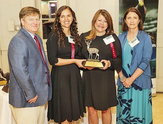 Natchitoches Parish 4-H agents Amanda Clark and Pam Pearce (center) are named Conservation Educators of the Year by the Louisiana Wildlife Federation.