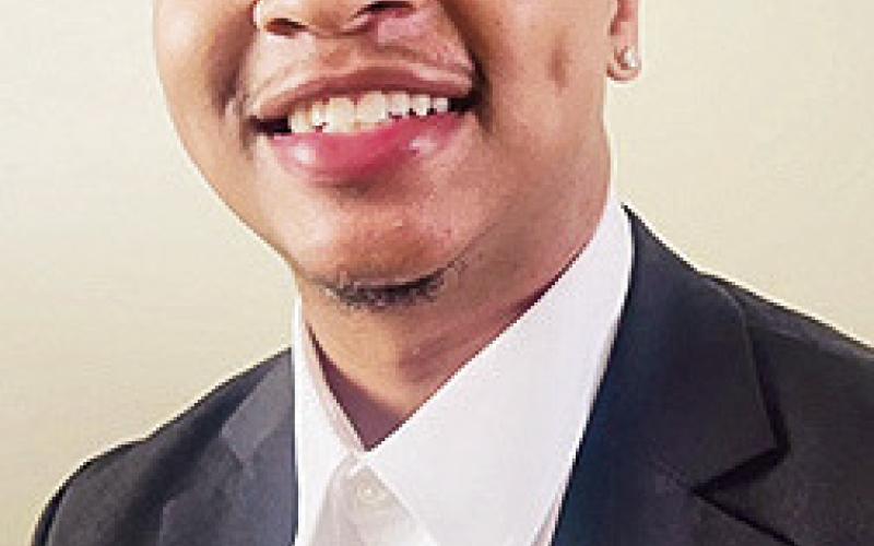Native son returns to library to sign copies of his poetry collection on Saturday