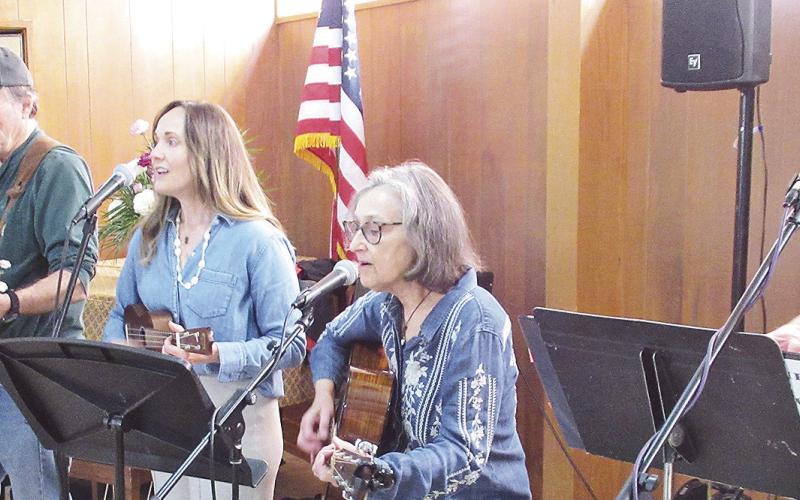 Home Grown Tomaters Band entertain those attending Young at Heart at First United Methodist Church March 4. Band members are, from left, David Clark, Geo Darfus, Julia Brown, Janet Darfus and Keith Shirley.