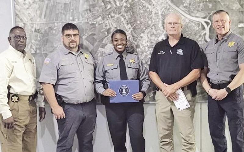 Dep. Ashley Mays graduated from the Alexandria Regional Police Academy. Congratulating Mays are, from left, Chief Dep. Darrell Winder, Capt. S. LaCaze, Mays, Sheriff Stuart Wright and Maj. Jesse Taitano.