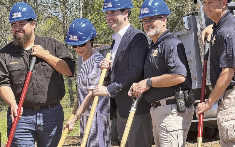 Pictured are Communications Supervisor Josh Adams, Commissioner Cindy Coffey, Consultant Daniel Simpson, Captain James Moseley and Lt. Troy Murray.