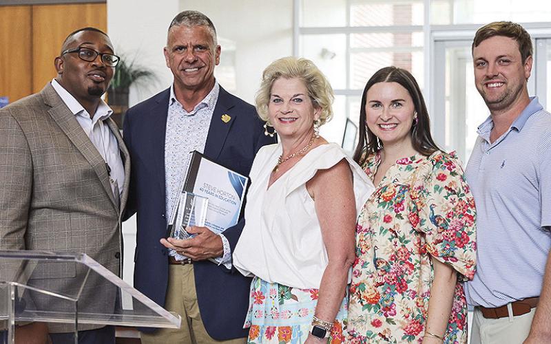 From left are Dr. Jason Anderson, Dr. Steve Horton, Emilyn Horton, Dr. Mary-Katherine Maggio and Scott Maggio.