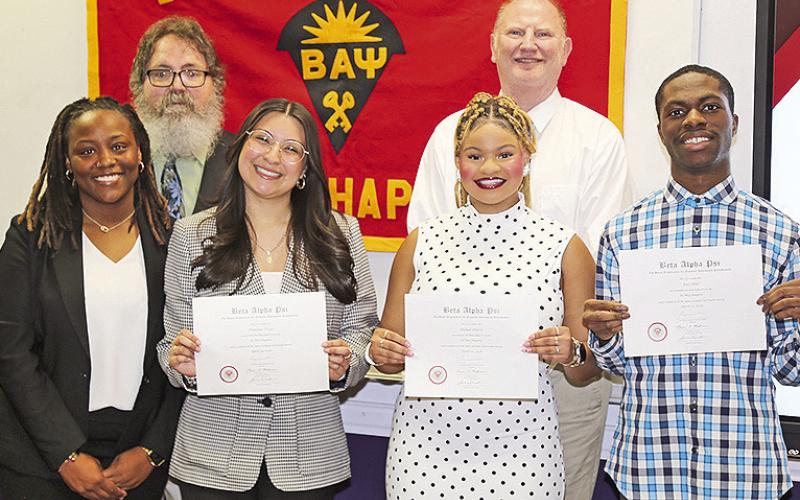 NSU’s Beta Alpha Psi, the honor society of financial information students, inducted new members April 20. On the front row from left are outgoing president Dexteria King with inductees Paulina Trejo, Denae Davis and Joel Hill. On the back row are College of Business faculty Dr. James Smith and Dr. Mark Swanstrom.