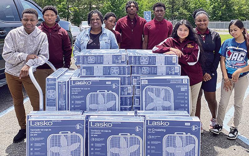 Demonstrating compassion and a commitment to community ser- vice, the Natchitoches Junior High JAG members recently donated box fans to the Natchitoches Council on Aging. With rising temper- atures approaching, the donation aims to provide comfort and relief to local senior citizens during the warmer months. The JAG mem- bers took initiative in organizing and contributing to this effort, showing a deep understanding of the importance of giving back to those in need.