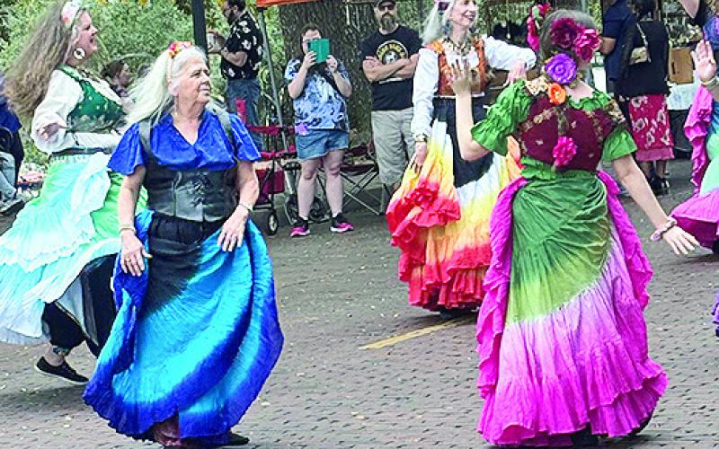 Local artists gathered along the historic bricks to welcome spring with their unique handcrafted pieces. Pictured are Indigeaux and Begindigeaux, Natchitoches’ belly dancing groups, who performed on the bricks in front of the Natchitoches Art Galley at Art Along the Bricks. The group performed to the music of the Rhythm Warriors comprised of veterans of friends.