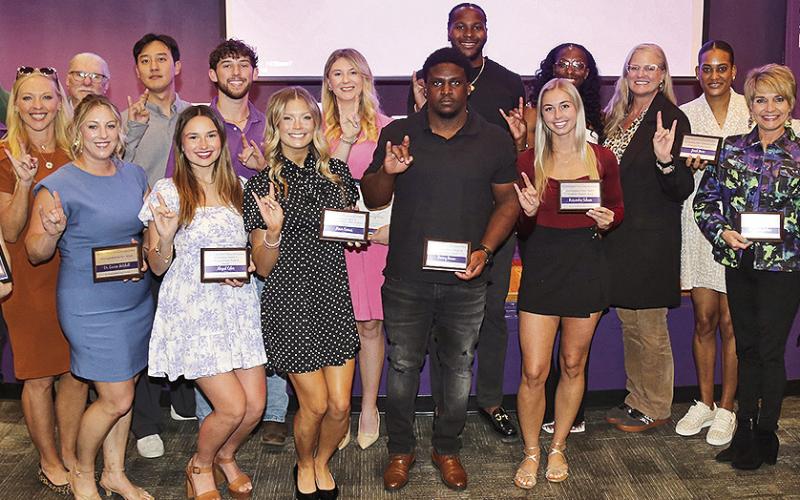 Honorees from the School of Kinesiology were, front row from left, Samantha Jordan, Dr. Haley Blount, Dr. Lauren Mitchell, Abigail Coker, Honor Camus, Donroy Brown, Kassandra Schoen, Tammy Dobson and Dr. Jackie Calhoun. On the back row are Dr. Michael Moulton, Dr. Sunggun Jeon, Joshua Peek, Cailen Wiltcher, Tarajh Hudson, Sileena Farrell, Dr. Tara Tietjen-Smith and Janiel Moore.