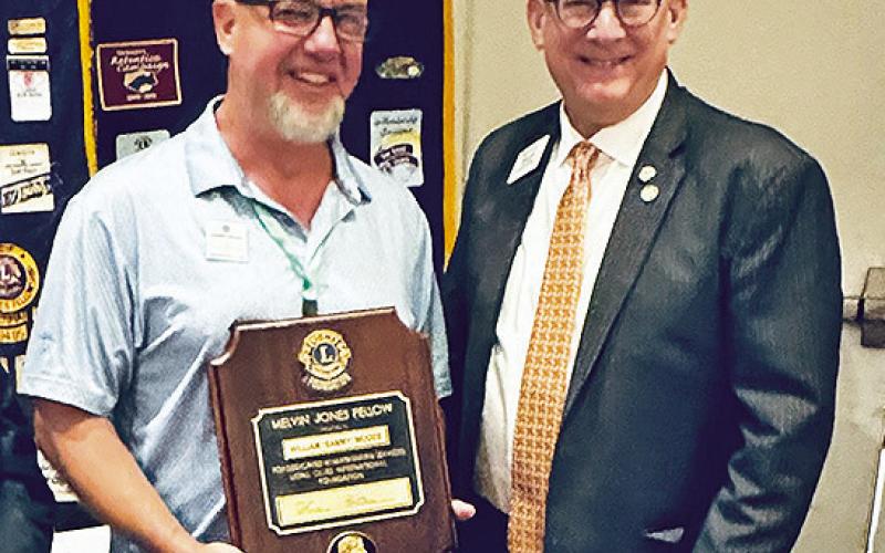 Sammy Woods was recognized by International Vice President Mark Lyons as a Melvin Jones Fellow for his contributions to the mission of Lions Club as well as his dedication to service.