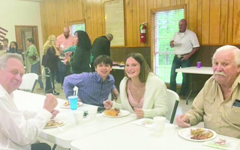 Frank Sims, Bo Walker, Bo’s granddaughter, Katlin Weeks and her friend enjoy breakfast at Old Bethel on Easter Sunday.