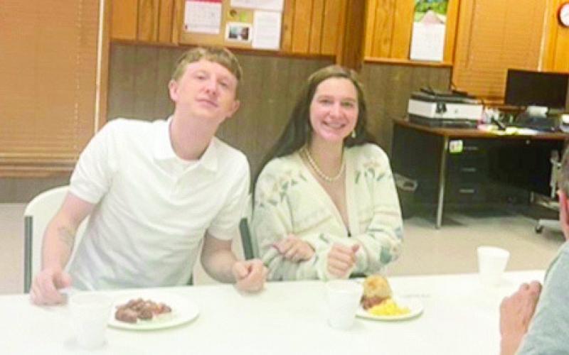 Amanda Weeks and a friend enjoy breakfast at Old Bethel Easter Sunday.
