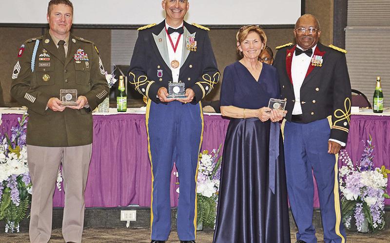 ROTC Senior Military Science Instructor MSG Michael Blakely, LTC Josh Drake, recently retired senior military instructor, and Sid Hall, recently retired ROTC program manager/NSU Military Affairs coordinator, were named honorary members of the Regiment. The honors were presented by Lt. Col. (R) Arthur Smalley, Regimental Chief of Staff for the Demon Regiment Executive Council.