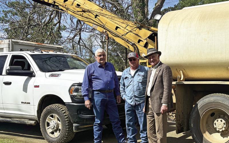 Parish President John Salter, left, and Parish Council District 3 Council Member Wayne Halm, right, were joined by Sabine Parish Police Juror Bruce Taylor who was part of the road construction crew that began working on Blanchard Road Monday April 6. The project should be completed in about four weeks.