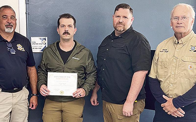 From left are Capt. G. Sers, Sgt. Cody Olliff, Maj. J. Byles and Sheriff Stuart Wright.