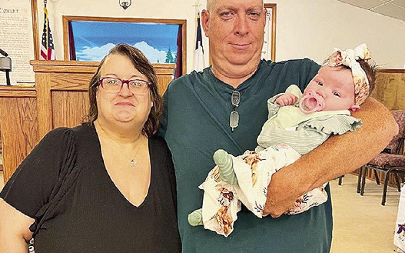 Bellwood Baptist Church sang happy anniversary to Debra and Gerald Cook. Helping them celebrate was their 3-month granddaughter, Ava Collins.