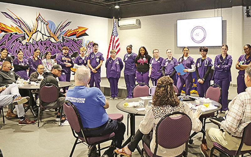 NSU nursing students in their first level of clinicals at the Natchitoches campus and their professor Dr. Shaun Wheat, far right, spoke to the Natchitoches Kiwanis Club about putting classroom knowledge into nursing practice.