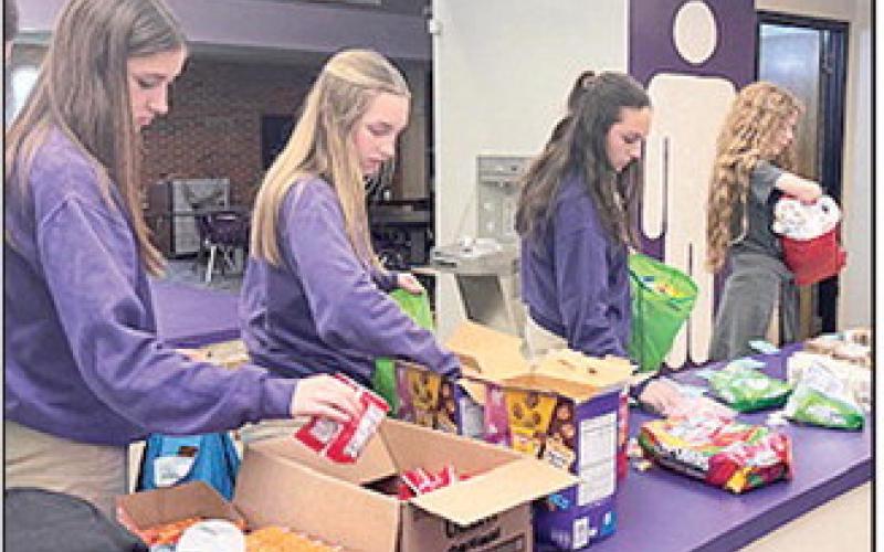 NSU Middle Lab Youth Volunteer Corps. delivers care bags to cancer patients