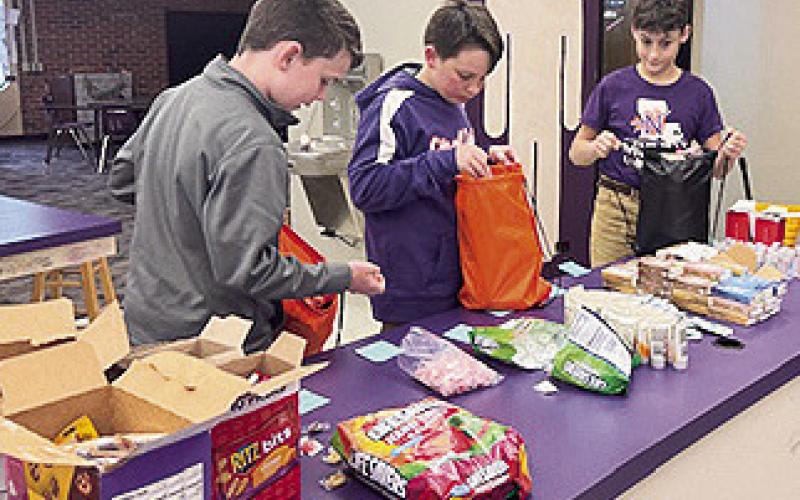 NSU Middle Lab Youth Volunteer Corps. delivers care bags to cancer patients