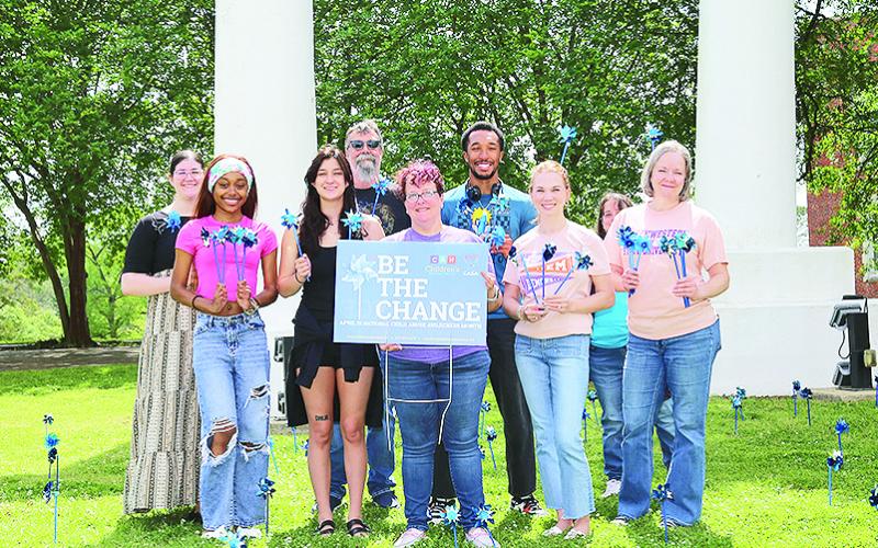 Students and faculty from NSU’s Department of Social Work planted pinwheels for Child Abuse Prevention Month. From left are Amelia Lewis of DeRidder, Ariel Williams of Logansport, Marina Moorehead of Alexandria, Byron McKinney, Lisa Mount, Jacobie McCormick of Franklinton, Kirby Peddy, Sherrie Davis and Jennifer Shaw.