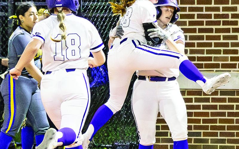 JT Smith celebrates with Sister Arnold following NSU’s 7-6 walk-off win against McNeese. Photo by Zoey Fitts, NSU Photographic Service