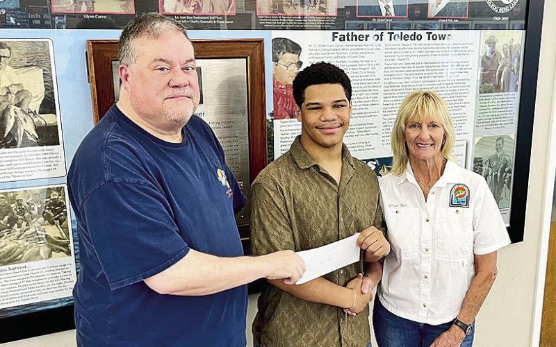 Caleb Corley of Negreet High School is awarded a $3,500 scholarship from The Toledo Bend Lake Association.