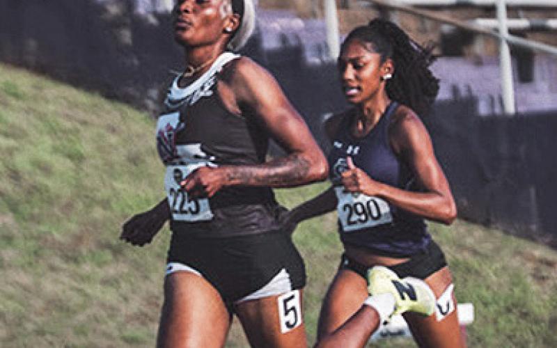 Rushana Dwyer (pictured, left) clocked a school-record 51.03 in the 400-meter dash to earn a trip to Saturday's quarterfinals on the first day of women's competition at the NCAA East First Round on Thursday. Photo courtesy of Southland Conference