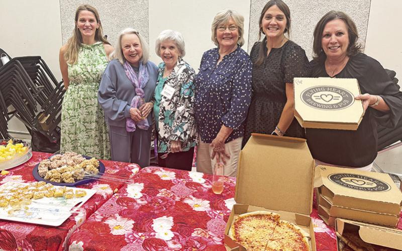 Helping serve the symphony members were, from left, Samantha Thomas, Marion Johnston, Mary Lou Brown, Cecelia Smith, Gina McCorkel and Tish McKnight.