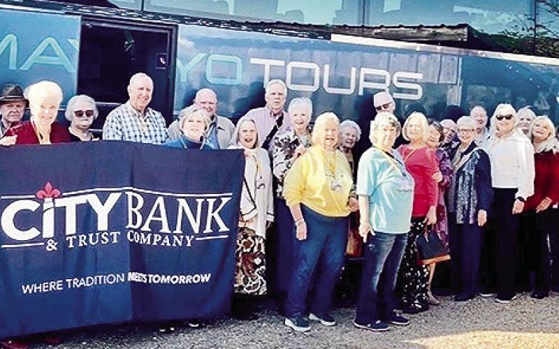 This group with City Bank went to see “The Messiah.: The group ate Tunk's Cypress Inn on Kincaid Lake.