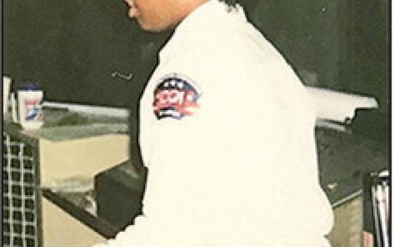 Bonita Moses in uniform as the first black female in Winn Corrections Emergency Response Team from 1990-1995.