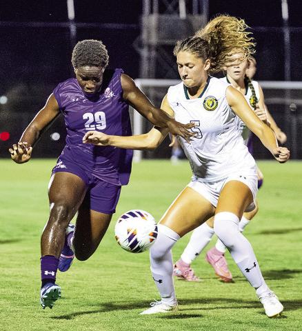 Northwestern State freshman Hosane Soukou, left, scored one goal and dished out two assists to lead the Demons to a dominant 3-0 win over McNeese on Thursday evening. The victory gives NSU a four-point lead in the Southland Conference title race. Photo by Chris Reich, NSU Photographic Services