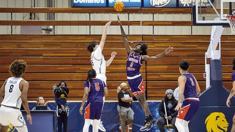 Northwestern State’s Jerald Colonel (2) challenges a shot by East Texas A&amp;M’s Tay Mosher on Saturday. Credit: Elayna Felder/East Texas A&amp;M Athletics