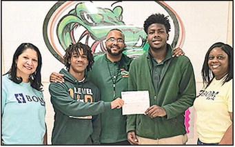 BOM Bank is proud to support the Lakeview High School football program! This donation will help with updating equipment, uniforms, and essential resources to keep athletes safe, prepared, and competitive this season. Pictured left to right: BOM’s Vallery Washington, Atlas Hicks, Head Coach Lawrence Seawood, Kaleb Jefferson, and BOM’s Brittany Robinson.