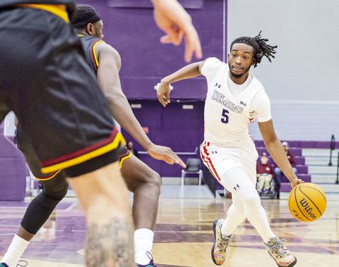 Micah Thomas (5) led Northwestern State with 19 points at Texas on Sunday. Photo by Chris Reich/NSU Photographic Services