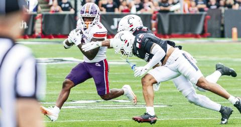 Northwestern State wide receiver Amaaz Eugene cuts upfield after making a catch against Cincinnati on Saturday. Photo by Brad Welborn/ NSU Sports Information