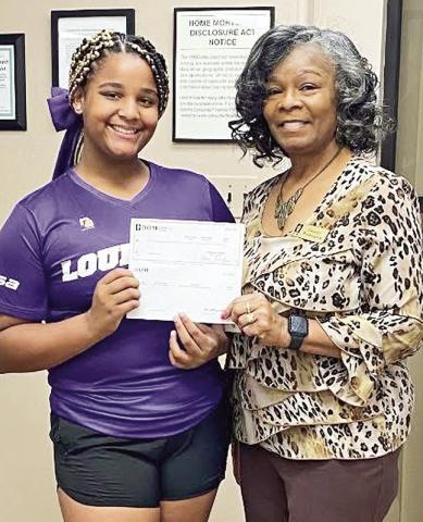 BOM made a donation to Bayleigh County. She was invited to participate in the USSSA National All State Championship December 28-31 at the USSSA Space Coast Complex in Viera, Florida. Pictured from left are Bayleigh County and BOM’s Lenette Washington.