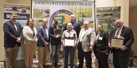 Agricultural producers who have participated in the Louisiana MasterFarmer Program were honored at a luncheon Jan. 9. Pictured from leftare Richard Fontenot, president of the Louisiana Farm Bureau Federa-tion; Tara Smith, AgCenter executive associate vice president and direc-tor of the Louisiana Cooperative Extension Service; Mike Salassi,AgCenter executive associate vice president and director of theLouisiana Agricultural Experiment Station; Wesley Volentine, Out-standing Master Farmer award recipient; Den