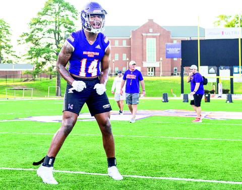 An excited Cadillac Rhone screams during Tuesday night’s opening practice of fall camp. Photo by Chris Reich/NSU Photographic Services