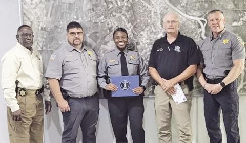 Dep. Ashley Mays graduated from the Alexandria Regional Police Academy. Congratulating Mays are, from left, Chief Dep. Darrell Winder, Capt. S. LaCaze, Mays, Sheriff Stuart Wright and Maj. Jesse Taitano.