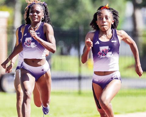 Tranasia Jones (center) and Samari Finney are half of the 4x400 women’s relay team that ranks first in the Southland Conference and coming off a strong showing at the Lurline Hamilton Invitational this past weekend. Photo by Chris Reich, NSU Photographic Services
