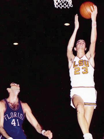 “Pistol” Pete Maravich scoring two of his 3,667 points with the LSU Tigers against the Florida Gators. Photo by John Musemeche.