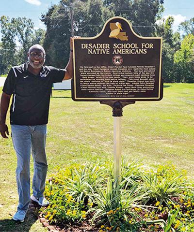 Rudy Macklin, Director of the Governor’s Council of Minority Health Services, visited Butte Tribe lands to help with thier beautification project. He is pictured with Butte Tribe’s new historical marker, Desadier School for Native Americans.