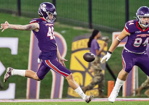 Scotty Roblow punts against Weber State in September. Photo by Chris Reich/NSU Photographic Services