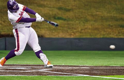Braden Benton drove in the Demons’ first run in Sunday’s loss to No. 24 Troy. Photo by: Chris Reich/NSU Photographic Services