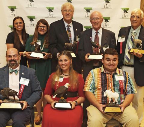 Pictured in the front row, from left, are Jason Adriance, Heidi Adams, and John Fox, Jr. On back row are Natchitoches Parish 4-H agents Amanda Clark and Pam Pierce, Mark Shirley, Charles Williams and James Foret.