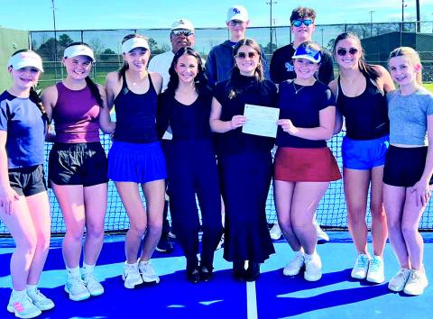 BOM made a donation to the St. Mary’s Catholic School tennis program. Pictured left to right: First row L to R: AK Sheffield, Peyton Faucheaux, Molly Smith, BOM’s Abby Williams &amp; Mary Anna Scruggs, Ainsley Armstrong, Ava Gill, and Jolee Shea. Second row L to R: Coach Willie Paz, Joseph Sklar, and Jackson Godfrey. Not pictured: Camille Armstrong and Peter Kautz.