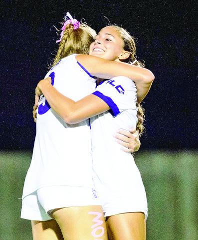 Kendall Hemperley (left) and Dawson Marrs celebrate Northwestern State’s first goal in a 20 victory over visiting Texas A&amp;M-Corpus Christi on Thursday evening at the Demon Soccer Complex. Photo by Chris Reich, NSU Photographic Services