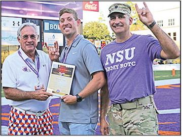 NSU welcomed Captain Gavin Bazer as the honorary guest captain during the Demon Football Homecoming game Oct. 4. From left are NSU President James Genovese, Bazer and LTC Joshua Drake, head of NSU’s Department of Military Science.