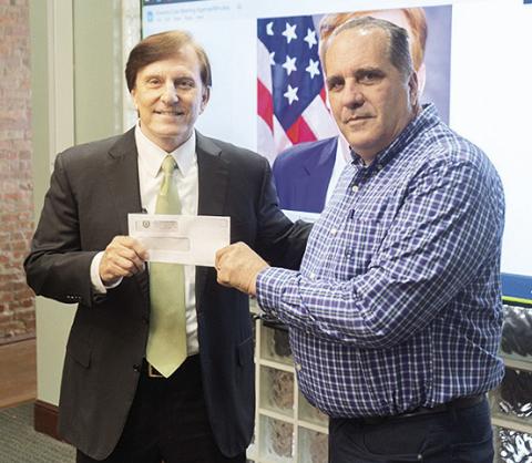 Treasurer Fleming delivered an unclaimed property check for $11,975 to Lafayette resident Kenneth Duhon, the rightful owner.