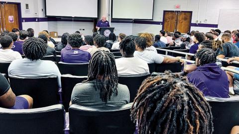 Head coach Blaine McCorkle addresses the Northwestern State football team during Monday’s report day. Photo by Brad Welborn/NSU Sports Information